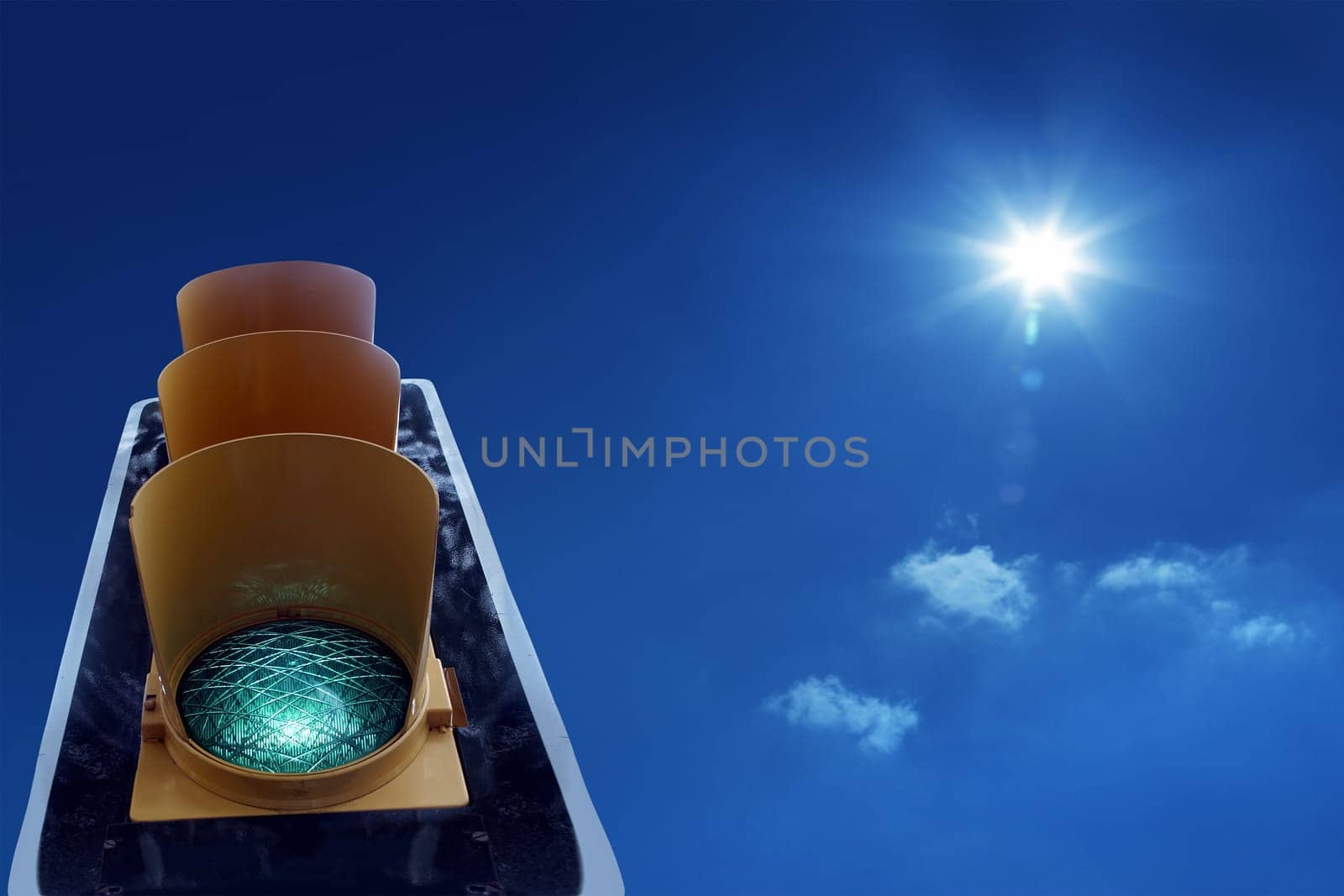 close up shot of traffic light on green