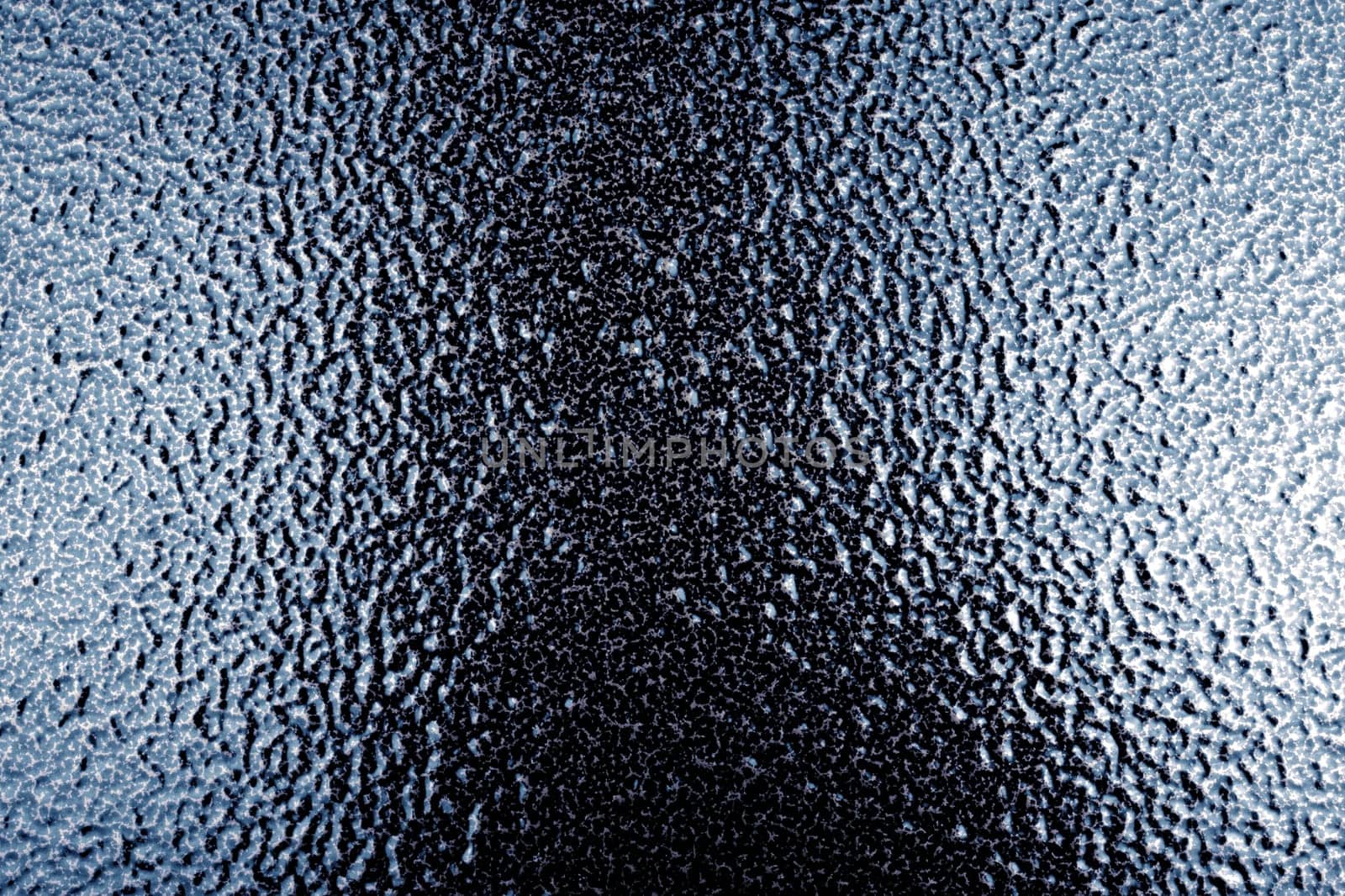 close up shot of grey shiny metal surface.