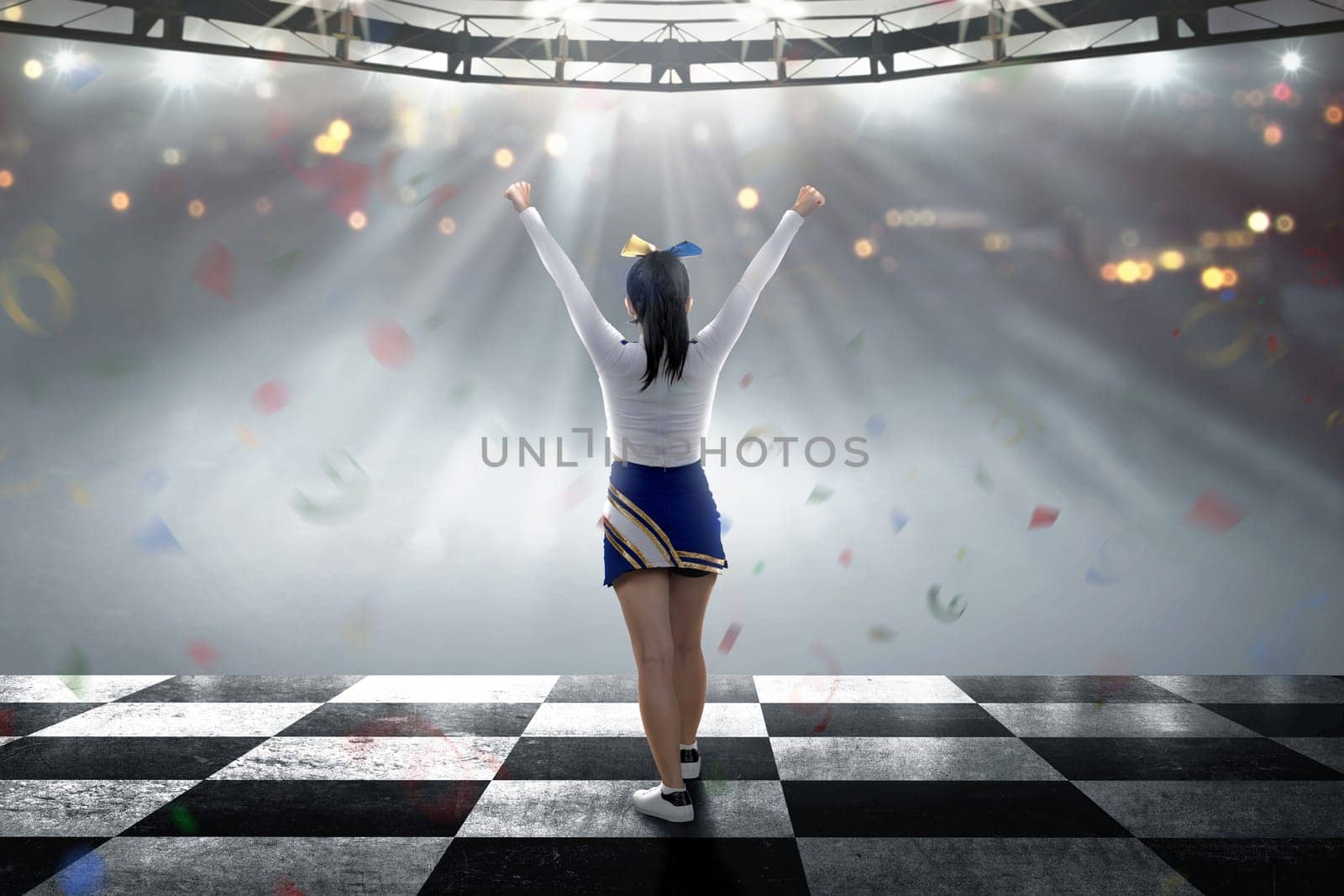 Rear view of asian cheerleader with happy expression on the stage