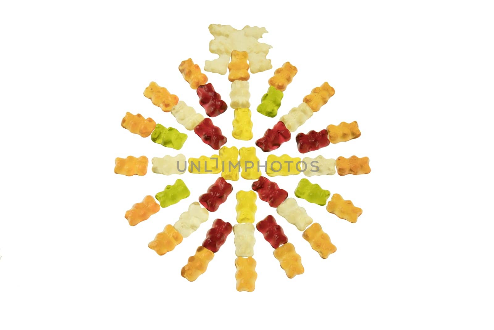 Circle of jelly bears with rainbow colors isolated on white background. The top of the circle is a manufacturing error of gummy bears. Concept jelly candy..