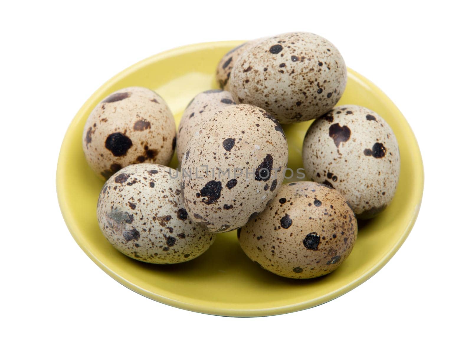 Quail egg in a yellow plate on the white background