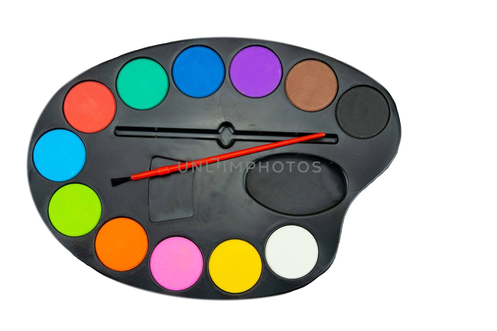 Watercolor paints and a paint brush isolated on white background. Back to school.