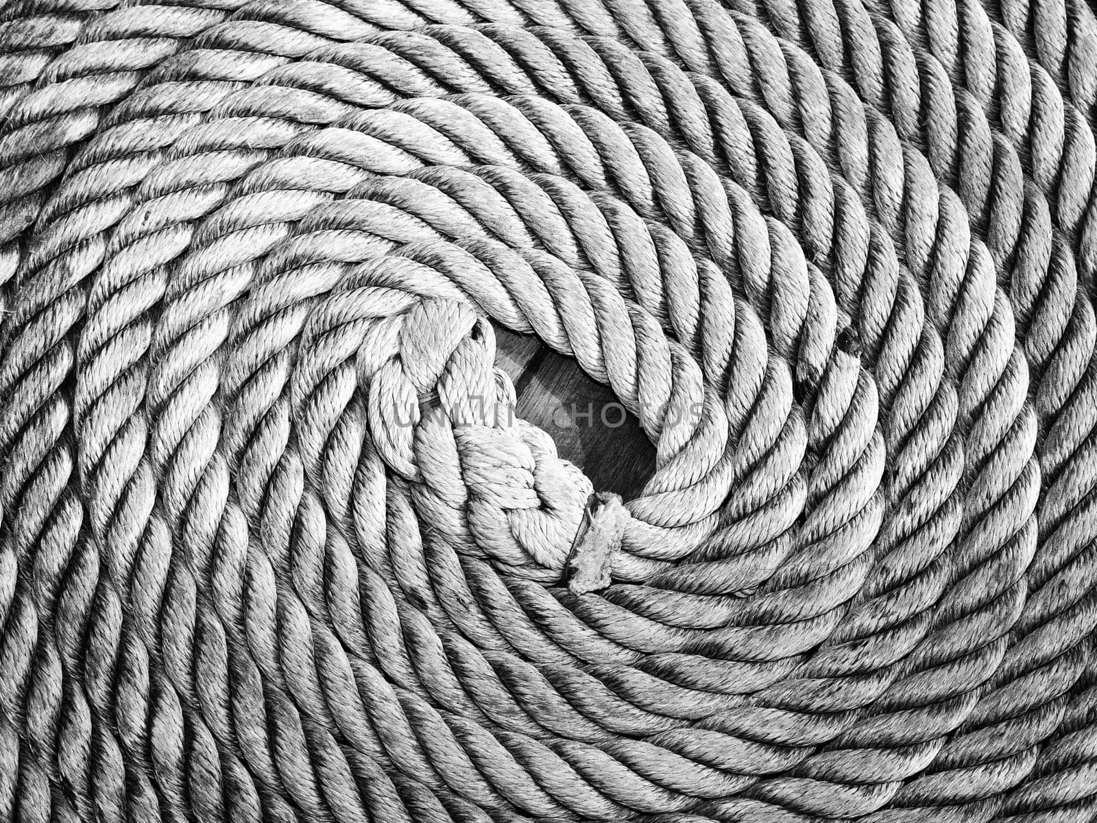 Abstract image showing a dizzying detail of a bound rope