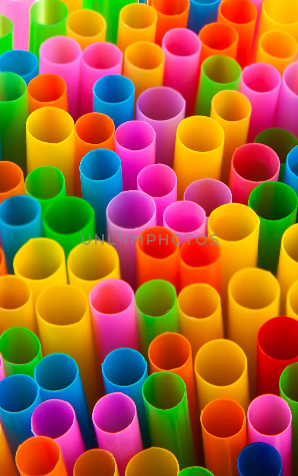 Abstract colourful image showing a multitude of drinking straws