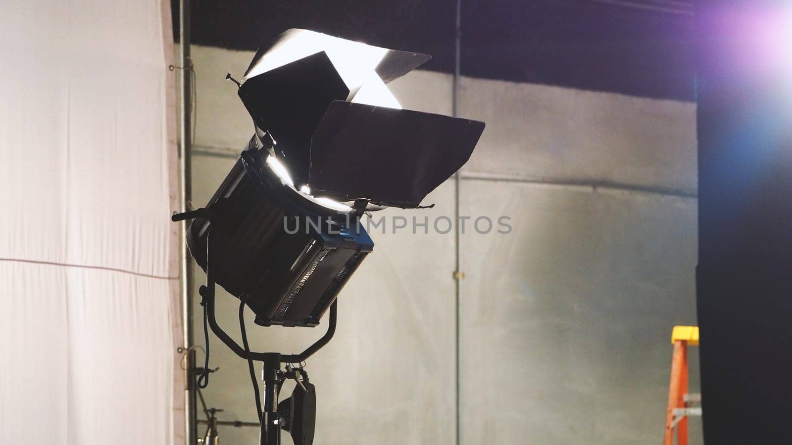 Big spotlight or lighting equipment for film movie or vdo shooting production in studio.