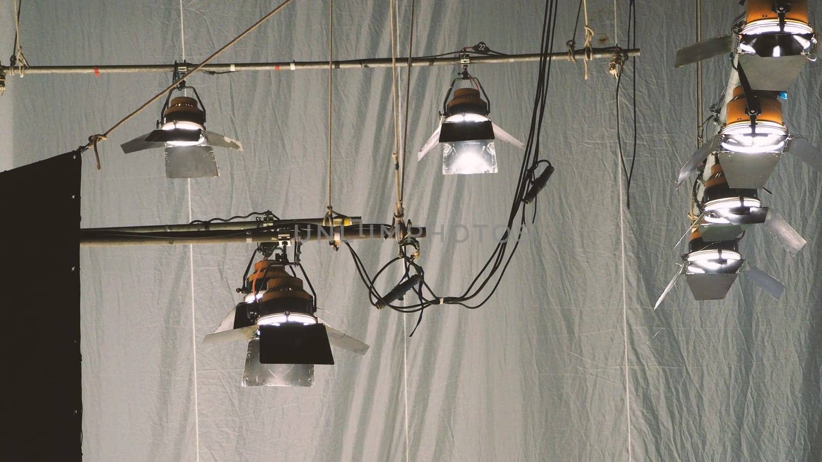 Big spotlight or lighting equipment for film movie or vdo shooting production in studio.