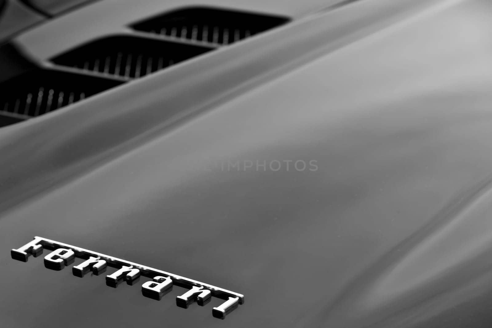LUQA, MALTA - DEC 11 - Detail from Ferrari bodywork during the annual PaqPaqli ghall-Istrina motorsport charity event at the MIA airfield.  Malta has the highest per capita rate of Ferrari owners in the world. 11 December 2011
