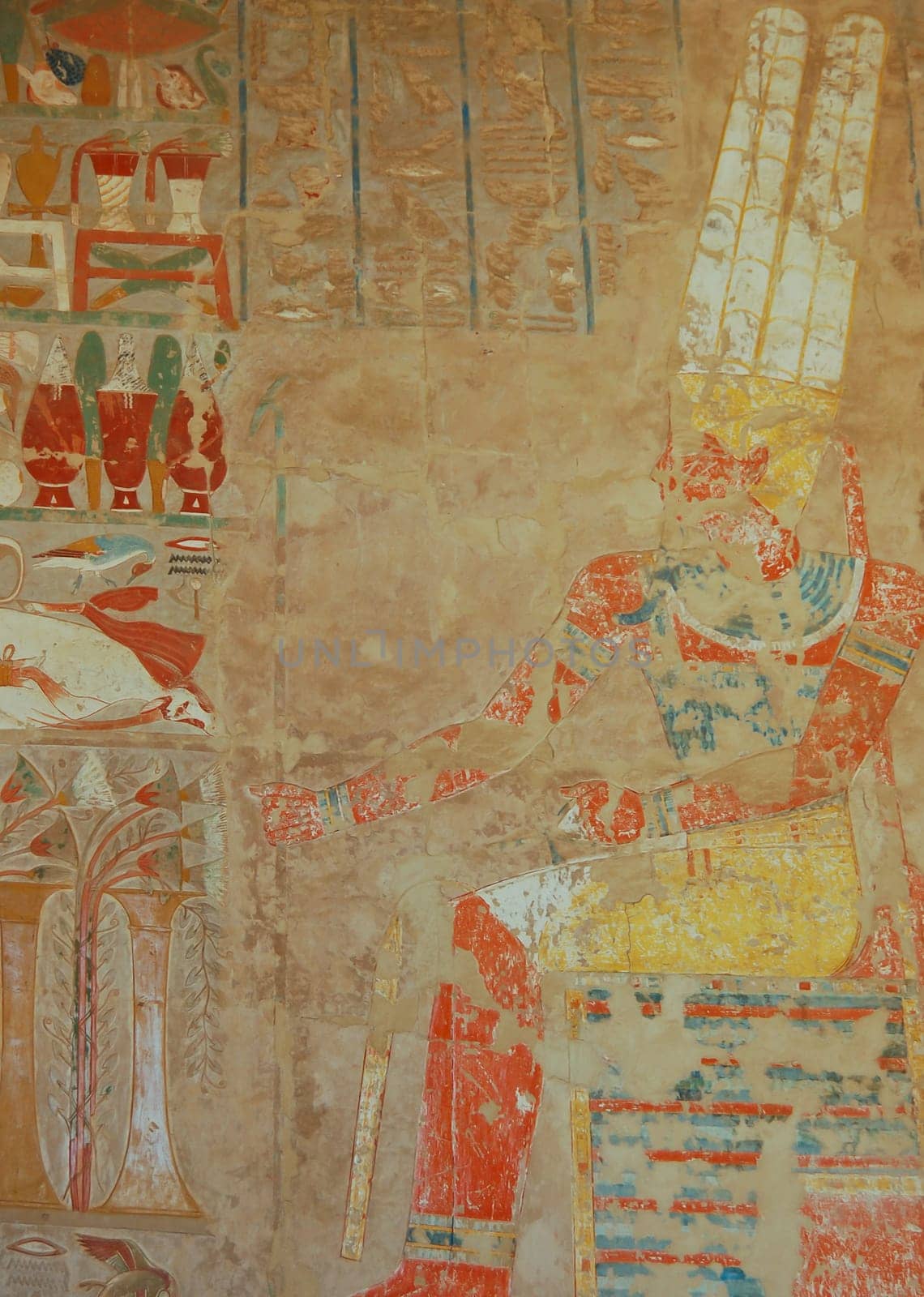 Amun god relief on wall in Hatshepsut temple, Egypt