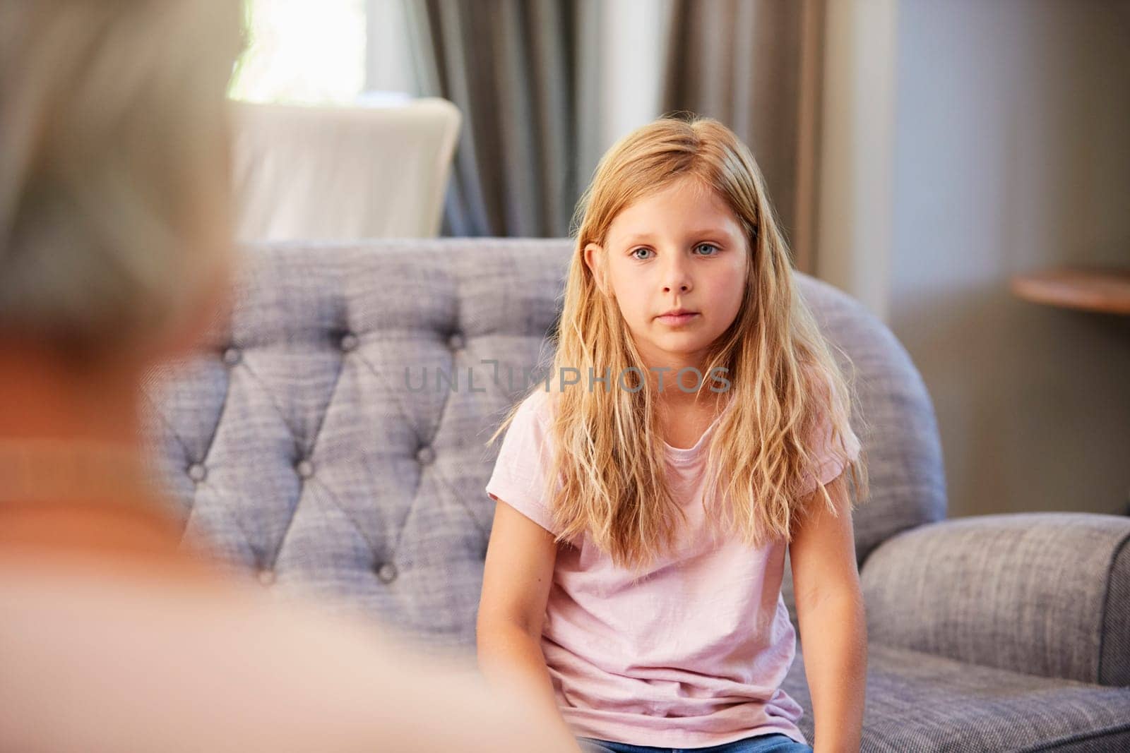 Young girl having therapy with a child psychologist