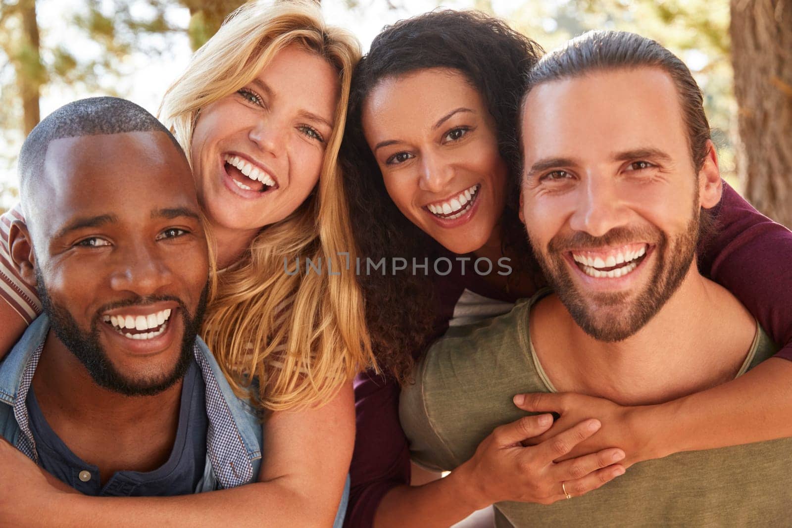 Portrait Of Young Friends On Hiking Adventure In Countryside