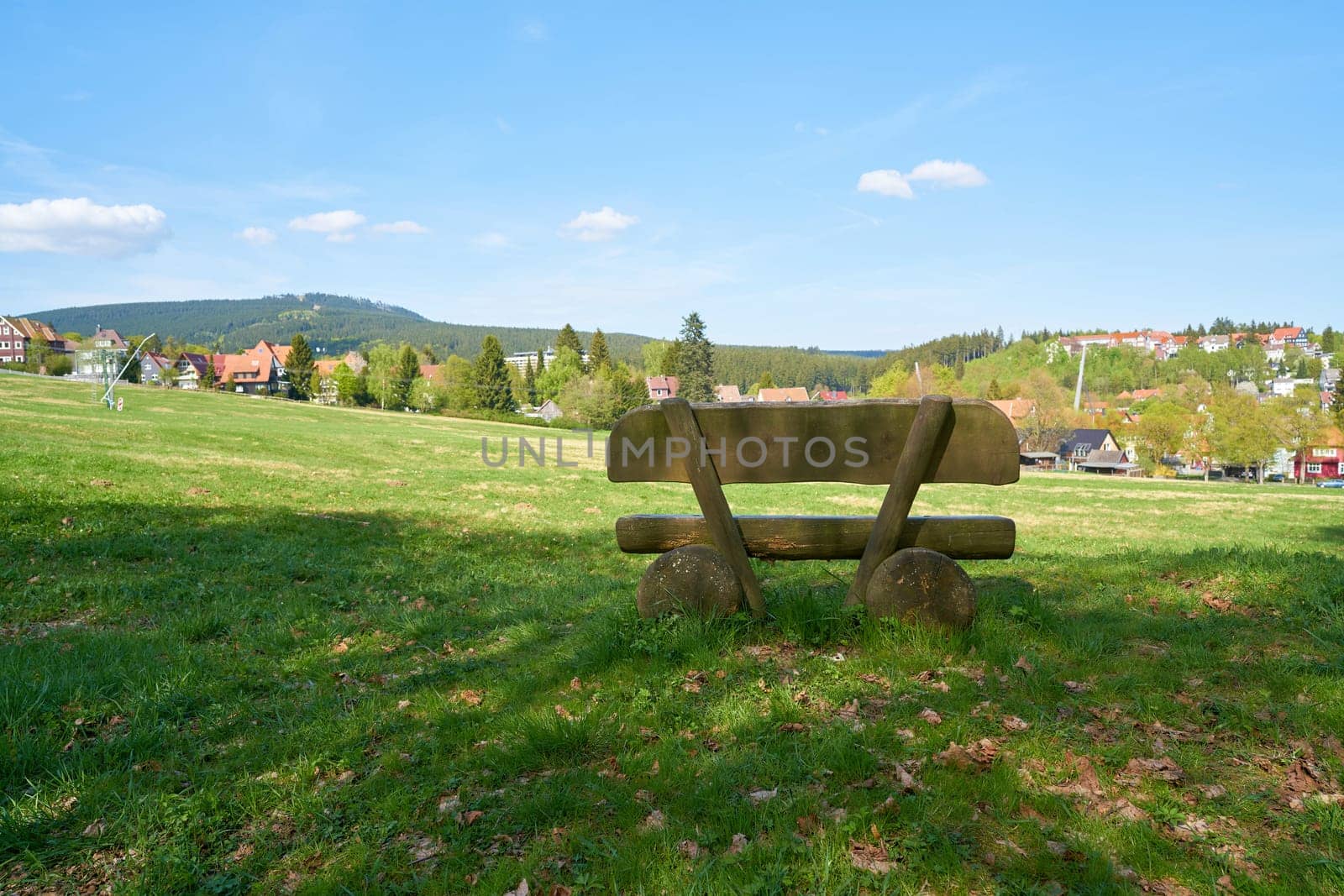 Bank on a hiking trail in the village of Braunlage in the Harz National Park