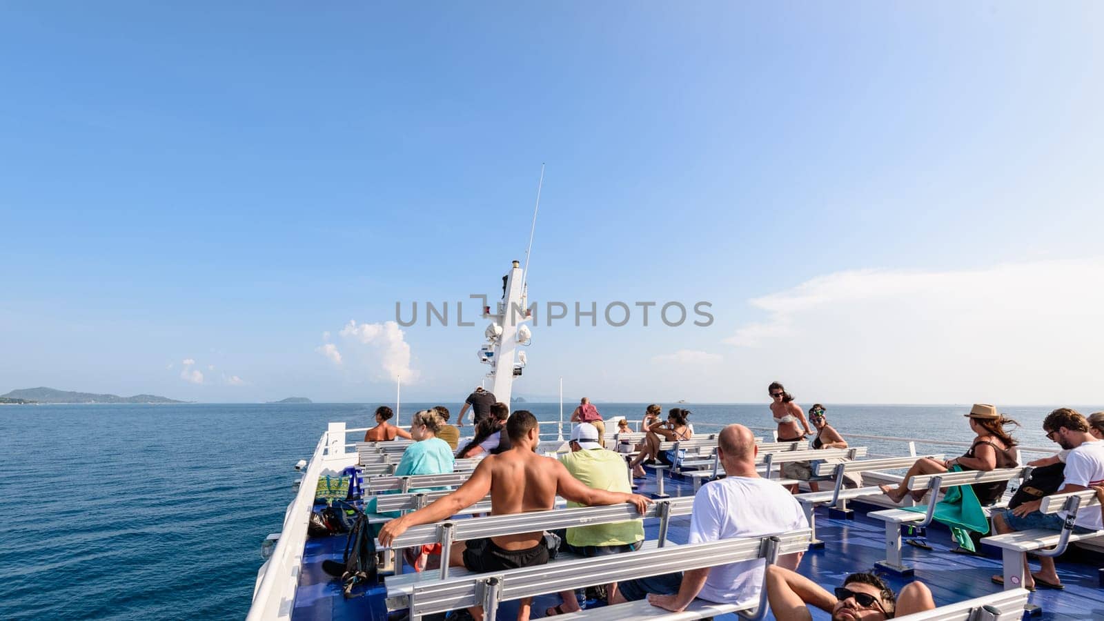 SURAT THANI, THAILAND-APRIL 28, Group of tourists on the deck are relax and enjoy the natural landscape of sea in summer during the travel by boat at Koh Samui island, APRIL 28, 2017 in Thailand