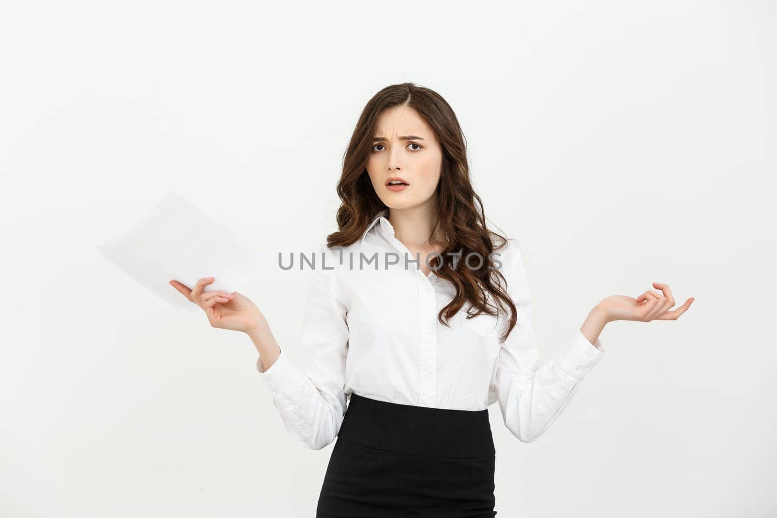 Worried businesswoman reading a notification isolated over white background