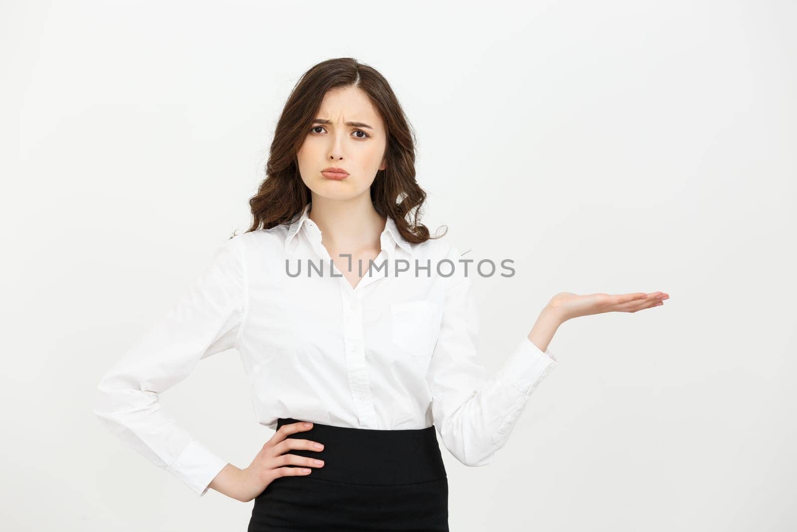 Portrait businesswoman showing and presenting copy space in business dress suit isolated on white background