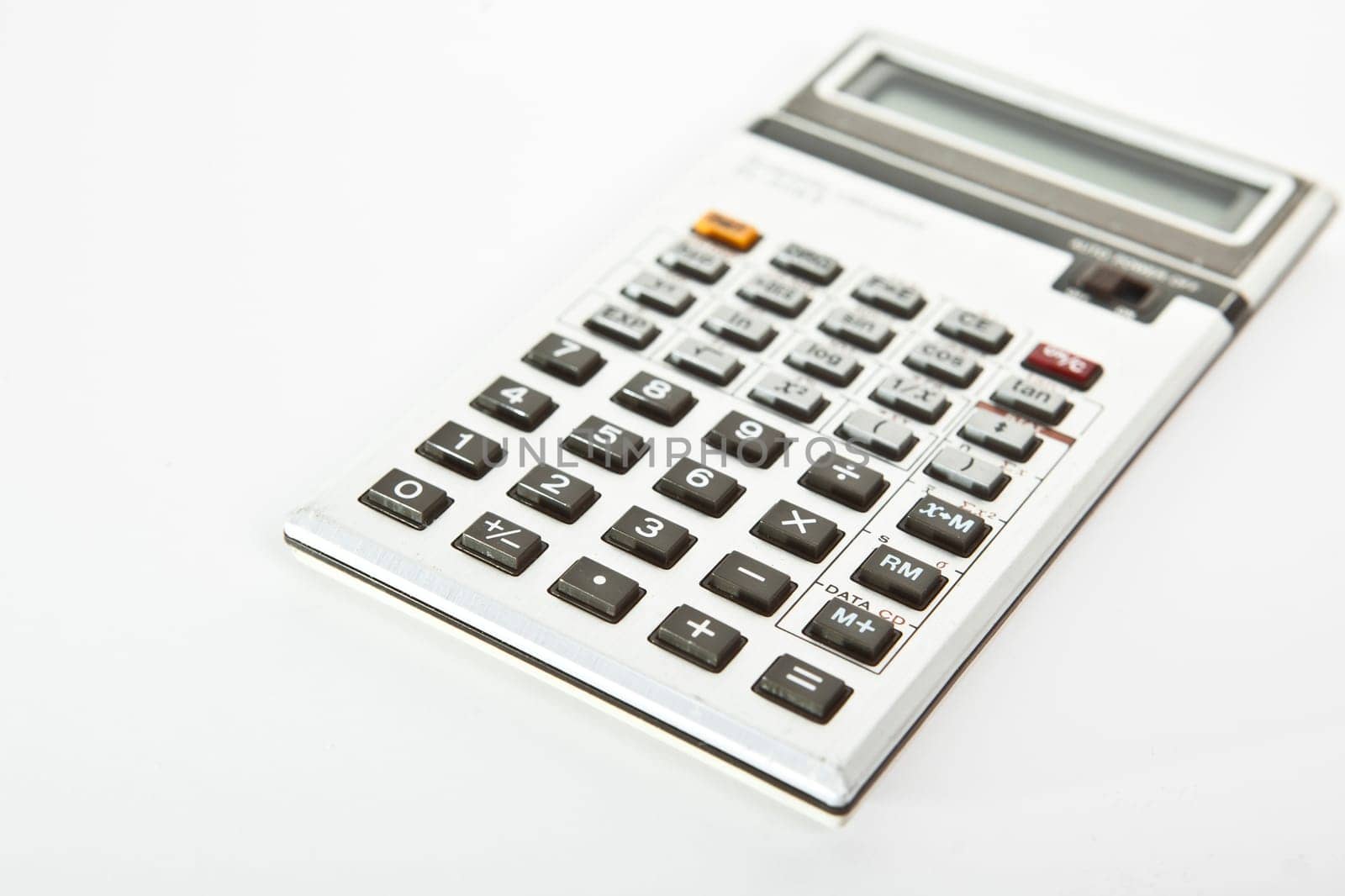 Retro scientific calculator over a white background