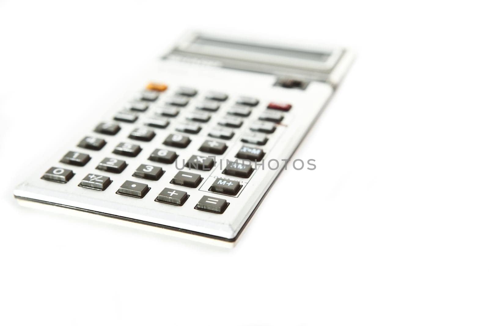 Retro scientific calculator over a white background