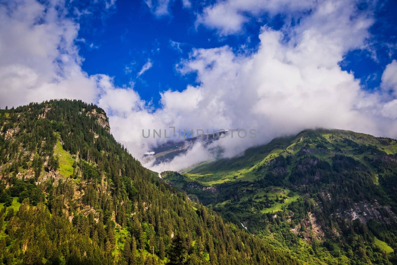 Hohe Tauern mountain landscape,Alps in Austria with source clouds