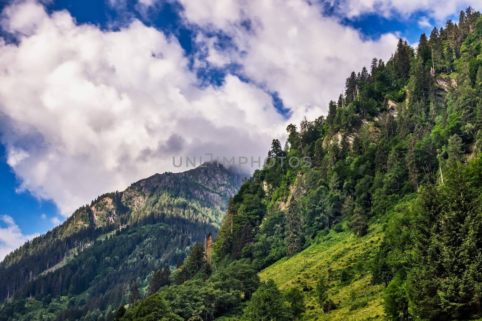Hohe Tauern mountain landscape,Alps in Austria with source clouds