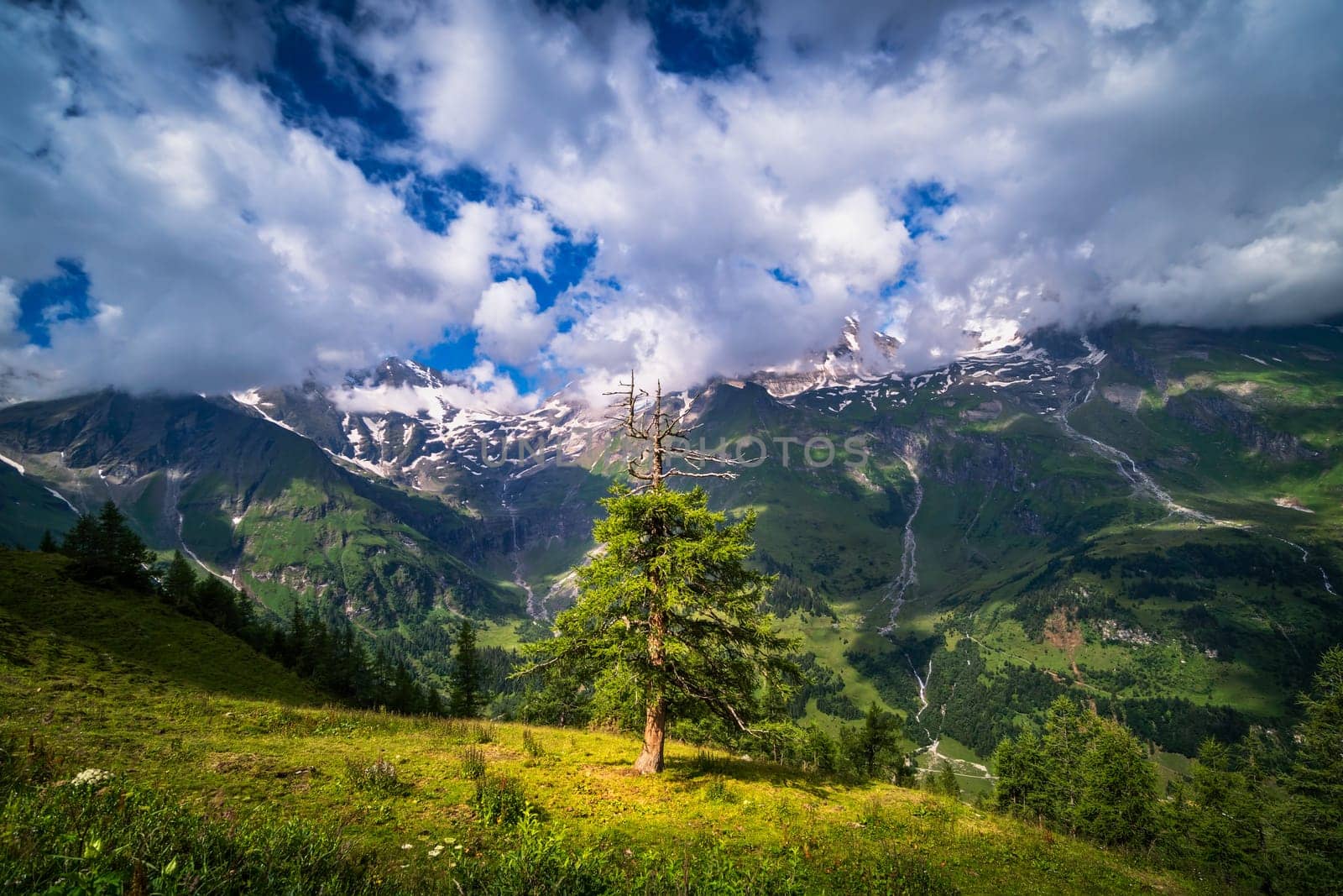 Hohe Tauern mountain landscape,Alps in Austria with source clouds