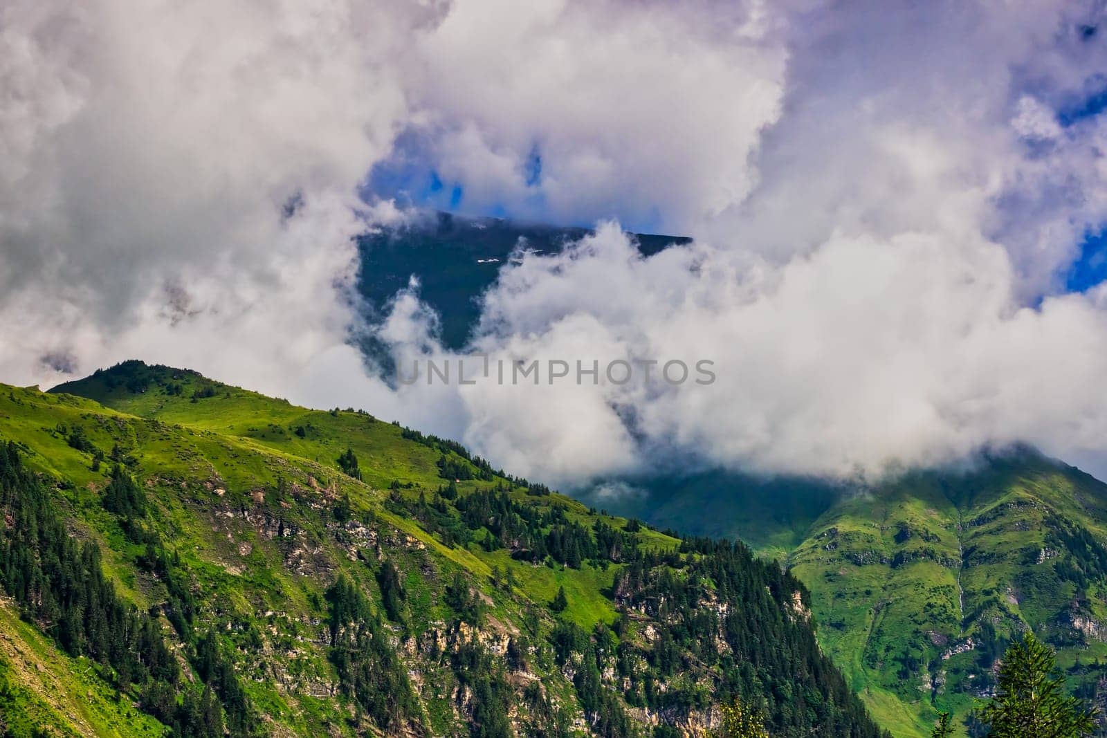 Hohe Tauern mountain landscape,Alps in Austria with source clouds