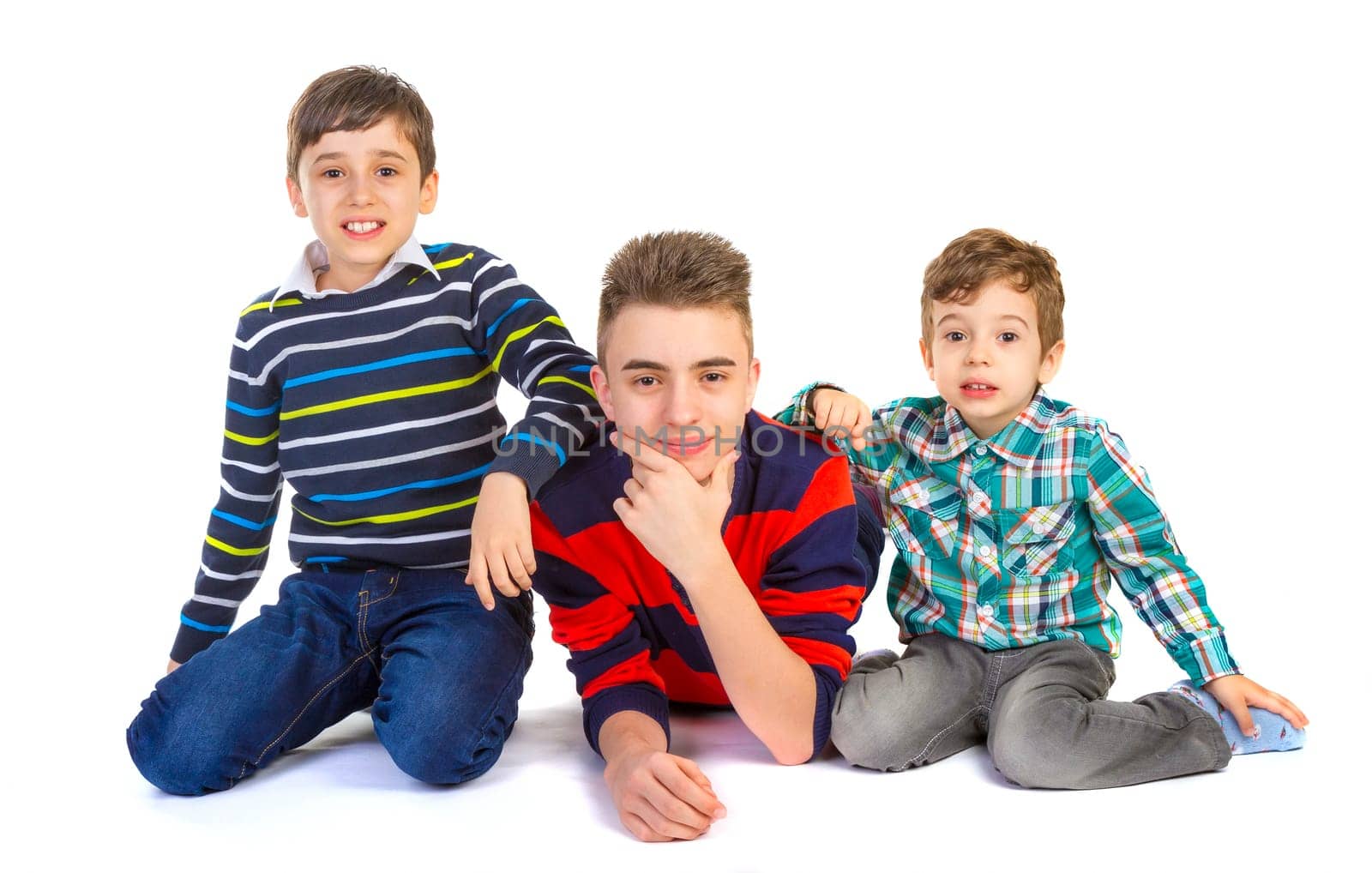 Shot studio with three brothers on white background