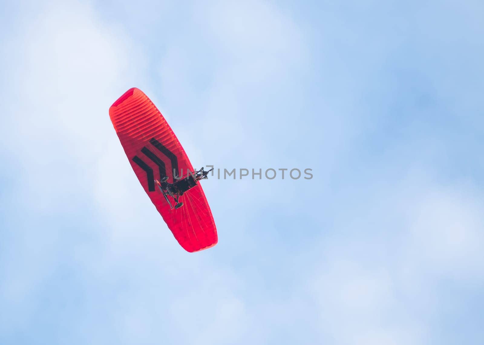 Paramotor in the blue sky