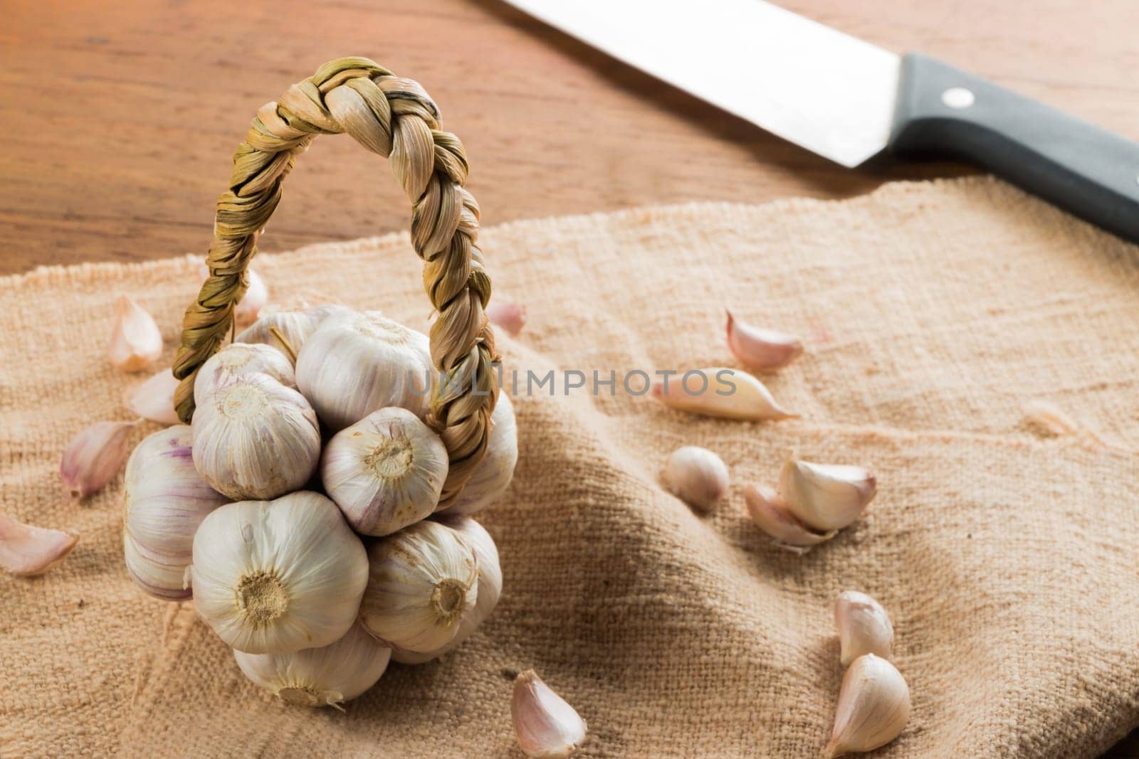 Organic garlic on wood table