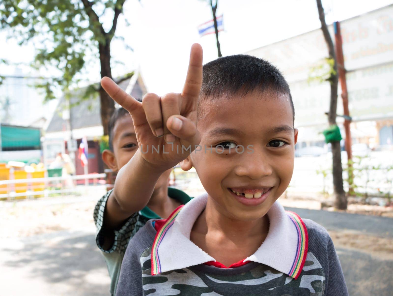BANGKOK-Dec 21: Unidentified Thai little boys play together in Playground at One community on Dec 21, 2014 in Bangkok, Thailand.