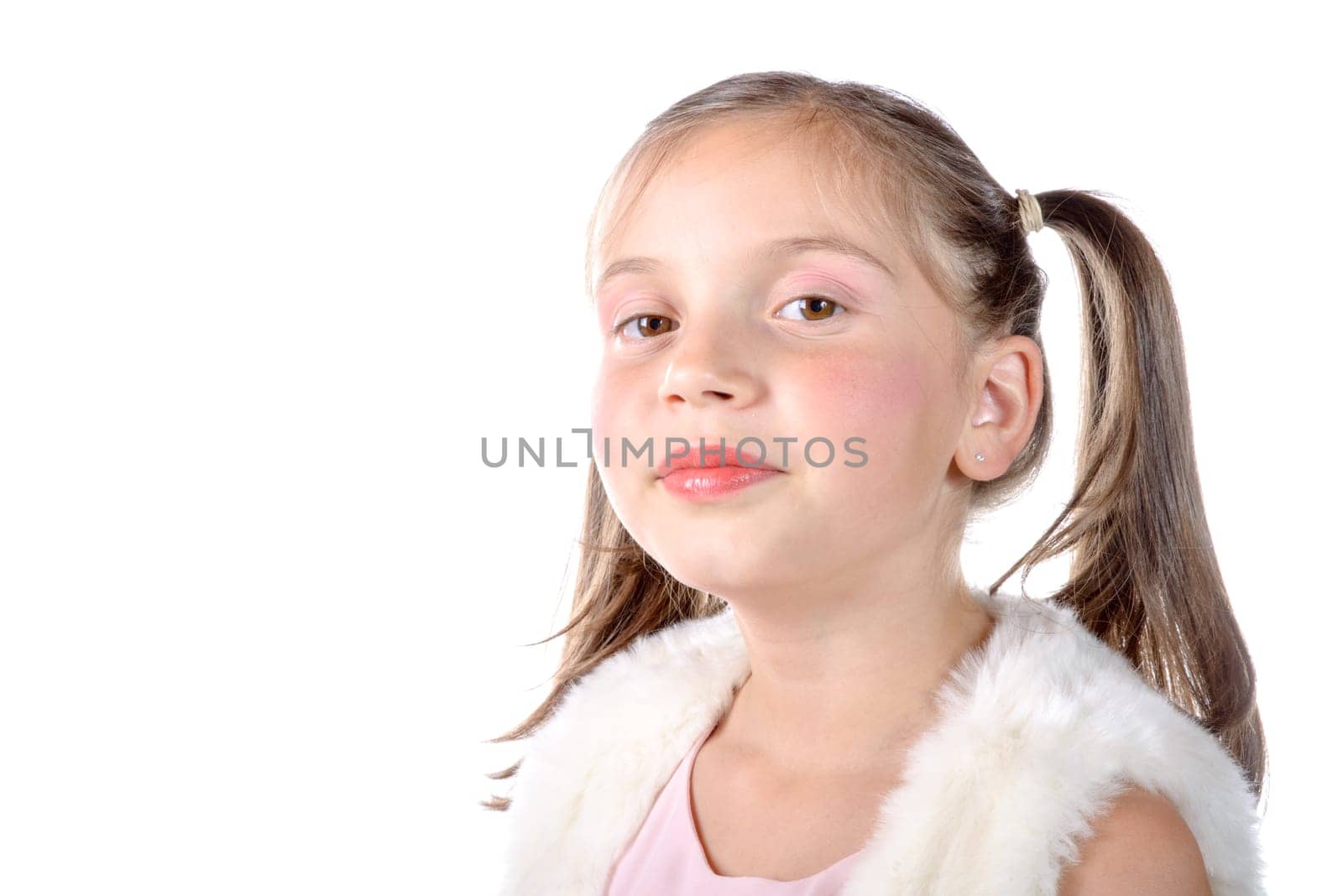 pretty little girl with pigtails on the white background
