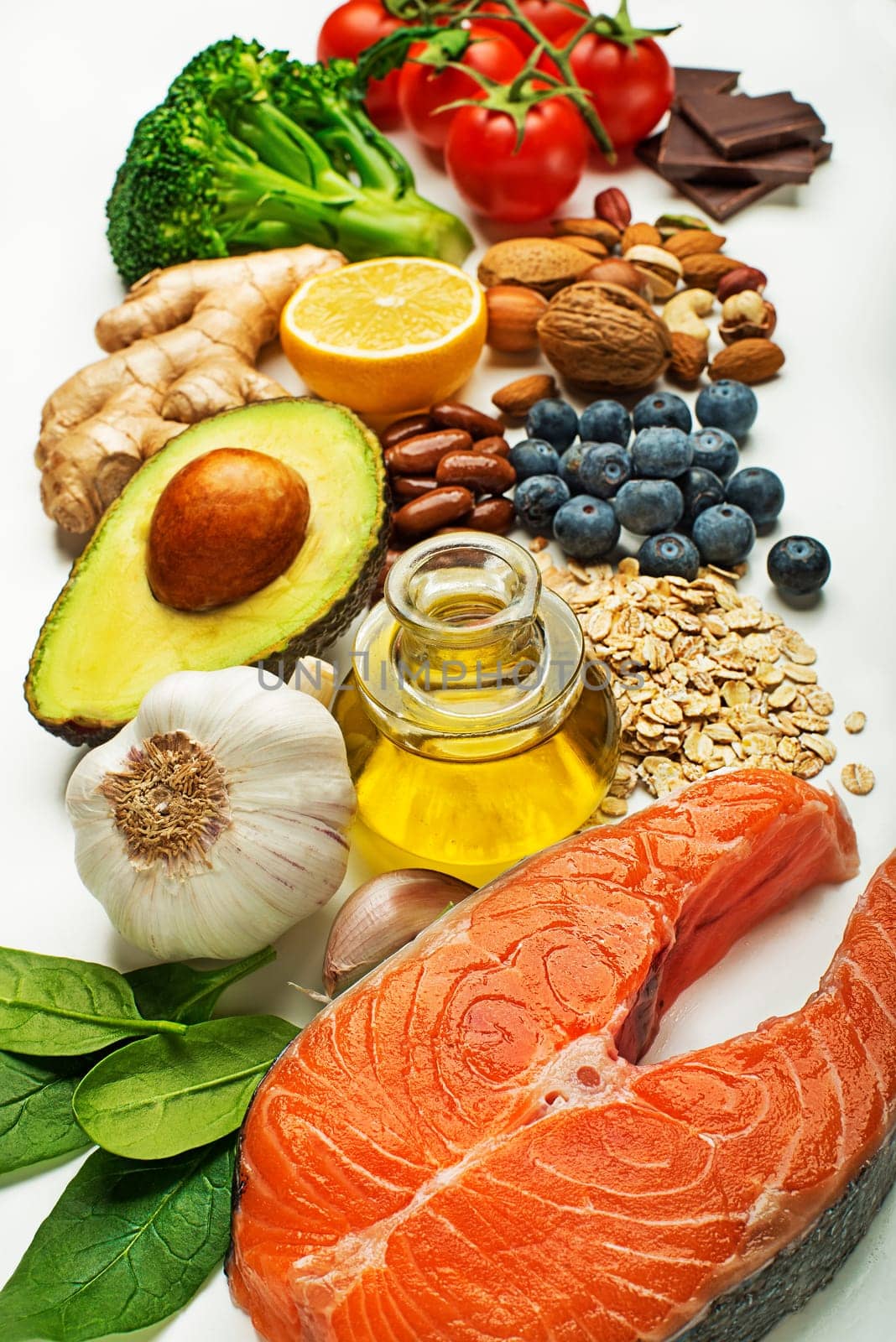 Selection of healthy food on white background. Healthy diet foods for heart cholesterol and diabetes.