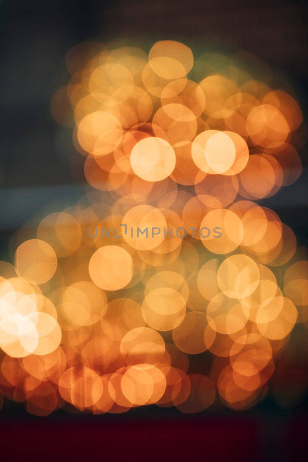 Abstract image of loads of warm lights defocused.
