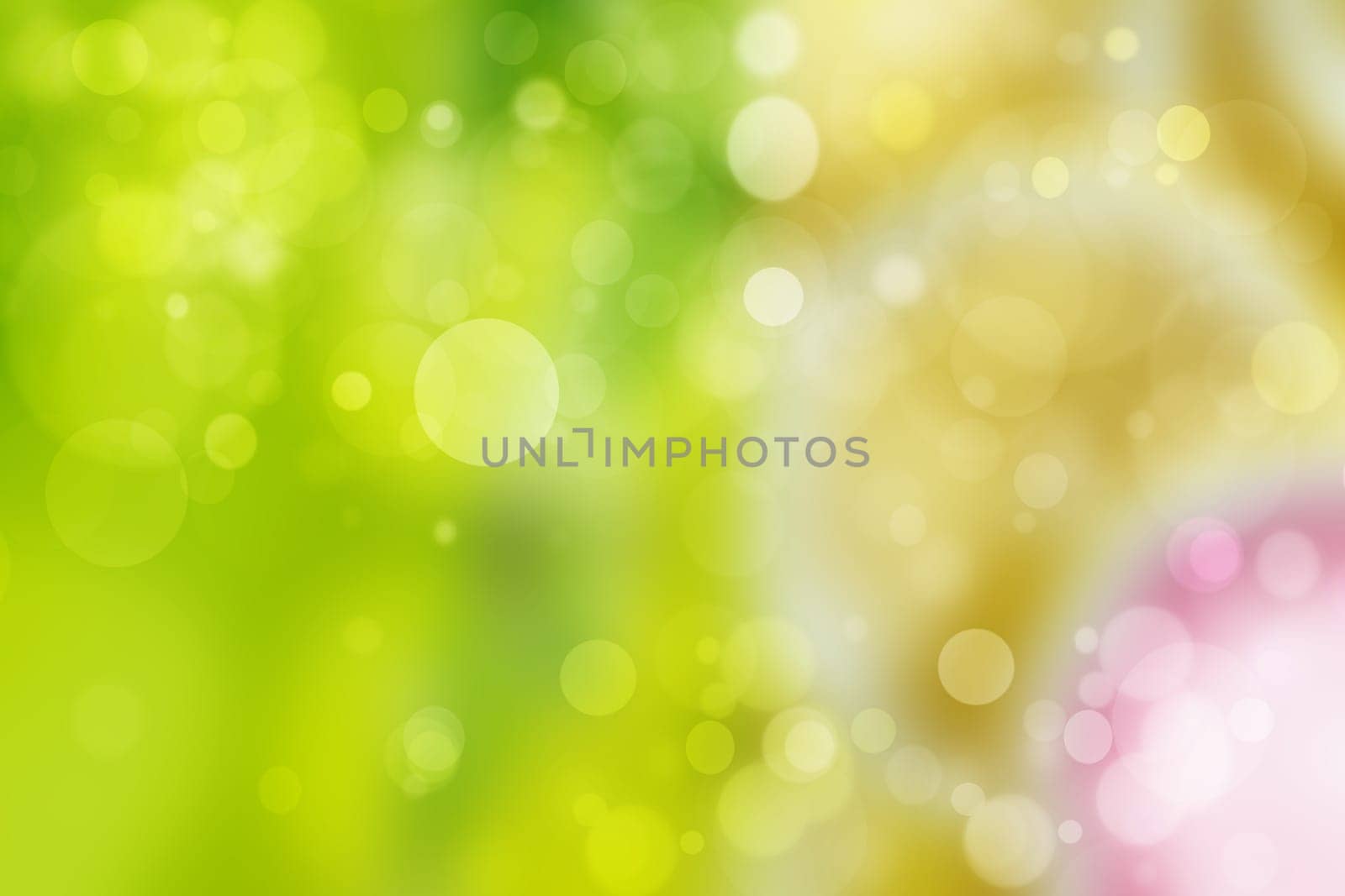 Abstract colorful gradient green yellow bokeh lights background texture.