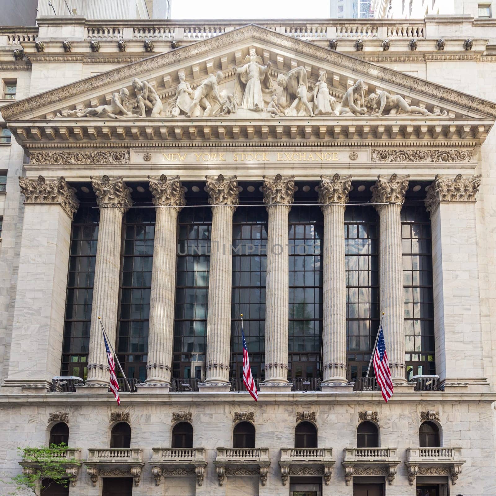 Exterior of New york Stock Exchange, largest stock exchange in world by market capitalization and most powerful global financial institute. Wall street, lower Manhattan, New York City, USA.
