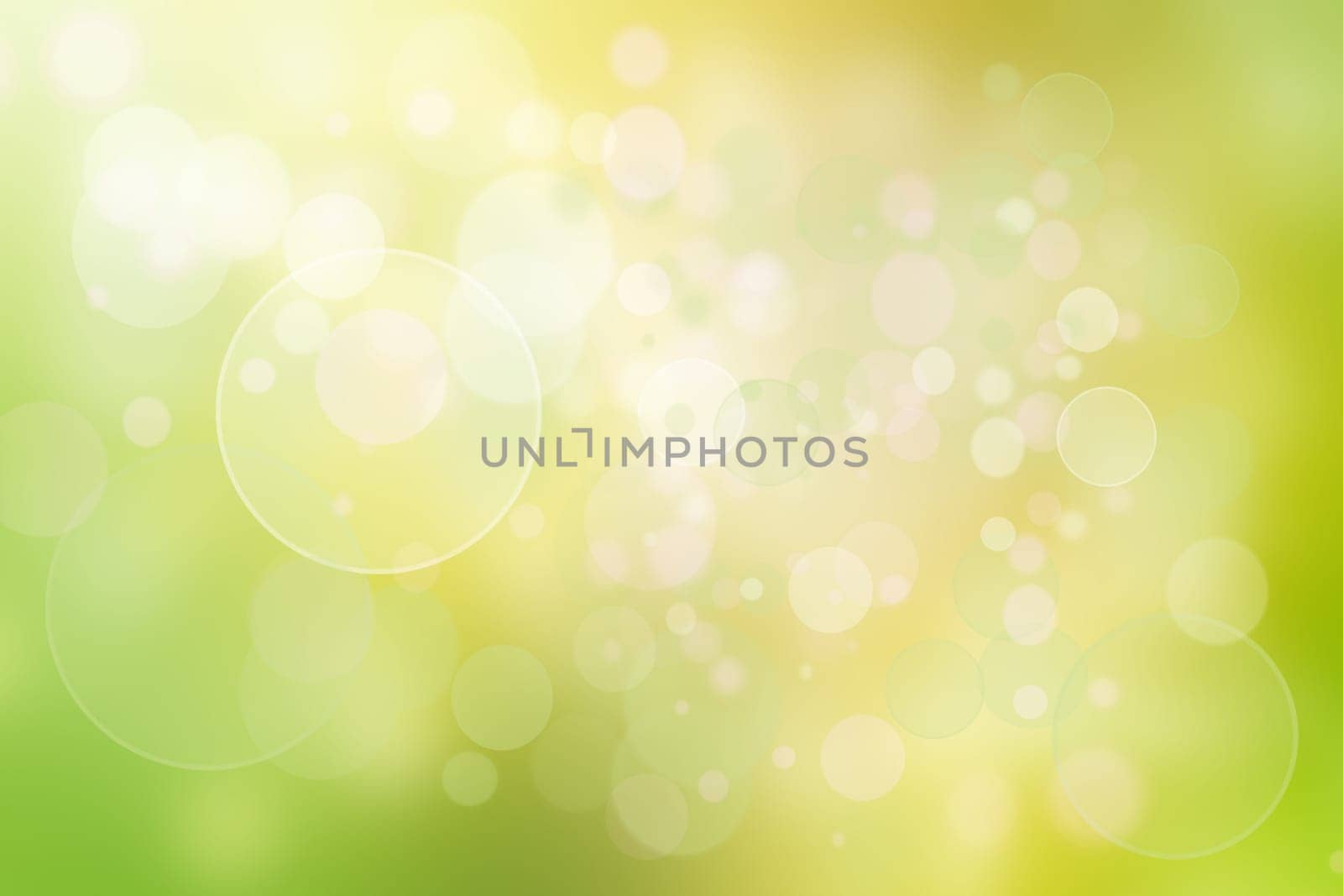 Abstract green light and yellow colorful summer bokeh background.