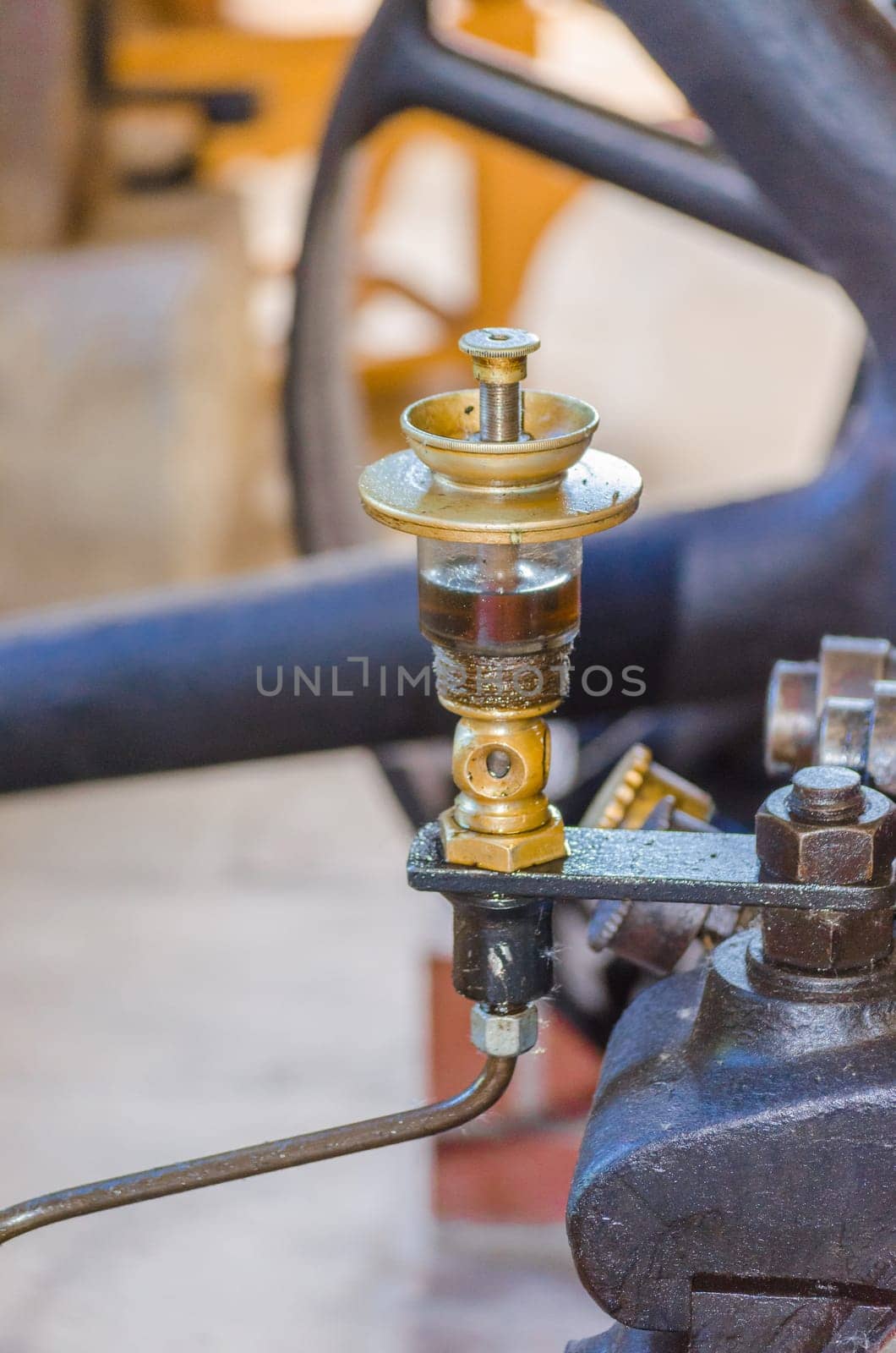 Close up of a steam engine Detail here in the picture Oil level gauge