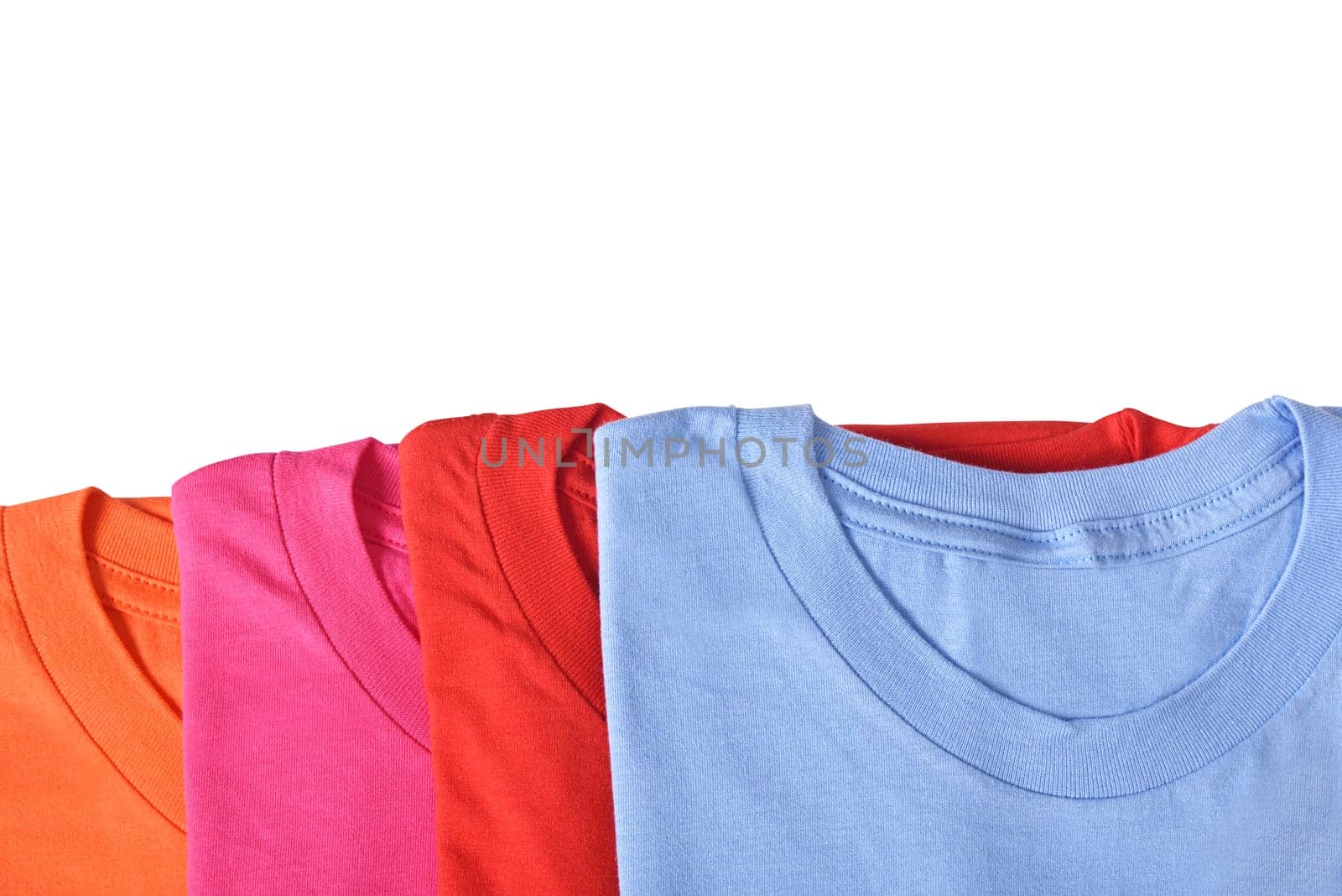 Row of colorful shirts isolated over white background