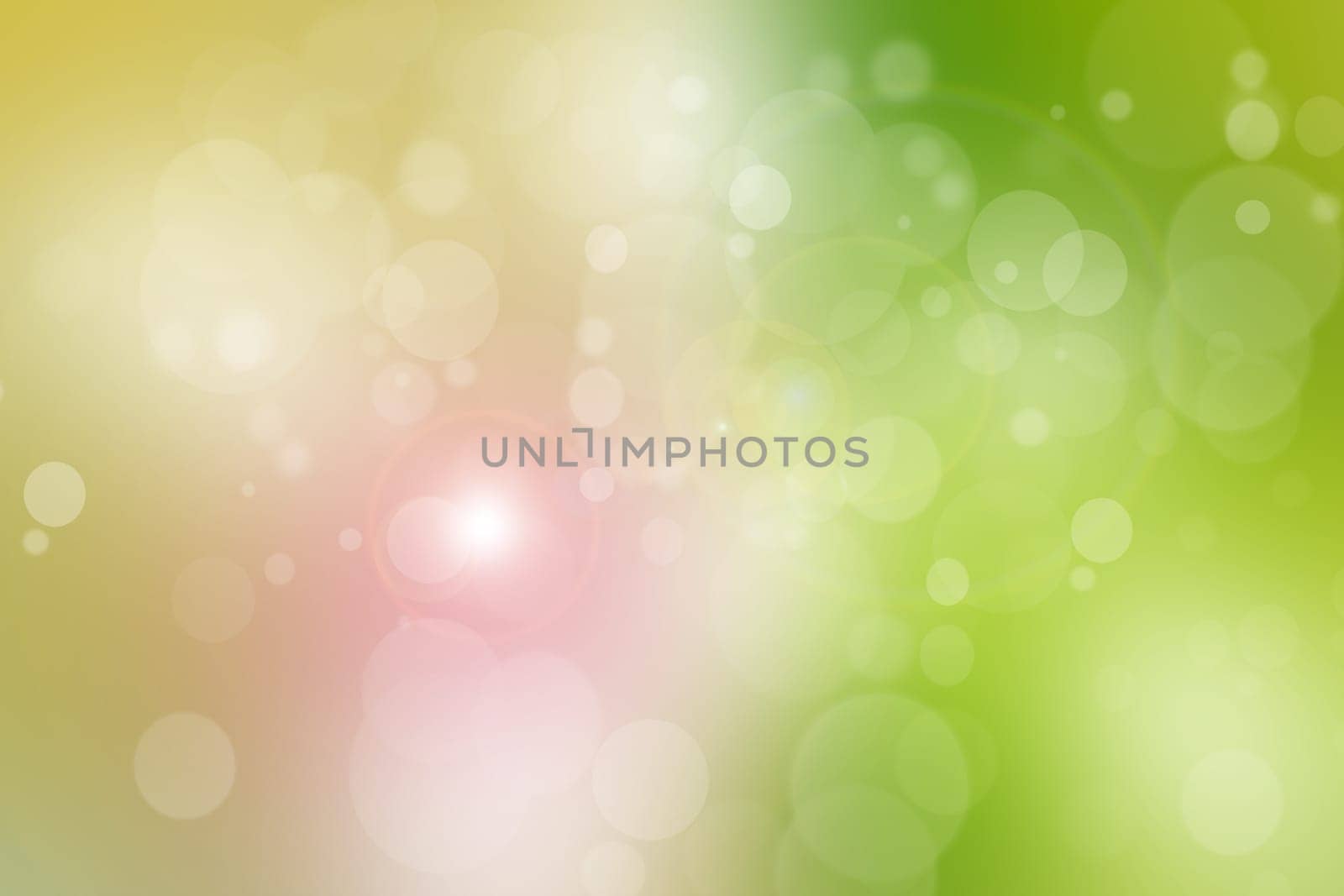 Abstract colorful gradient green yellow bokeh lights background texture.