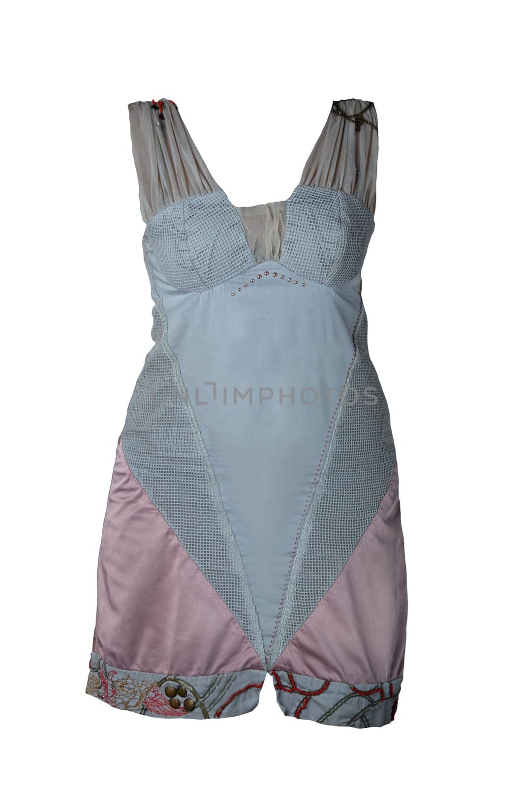 Fashionable summer clothes isolated on a white background. Gray pink summer dress with pattern. Summer fashion.