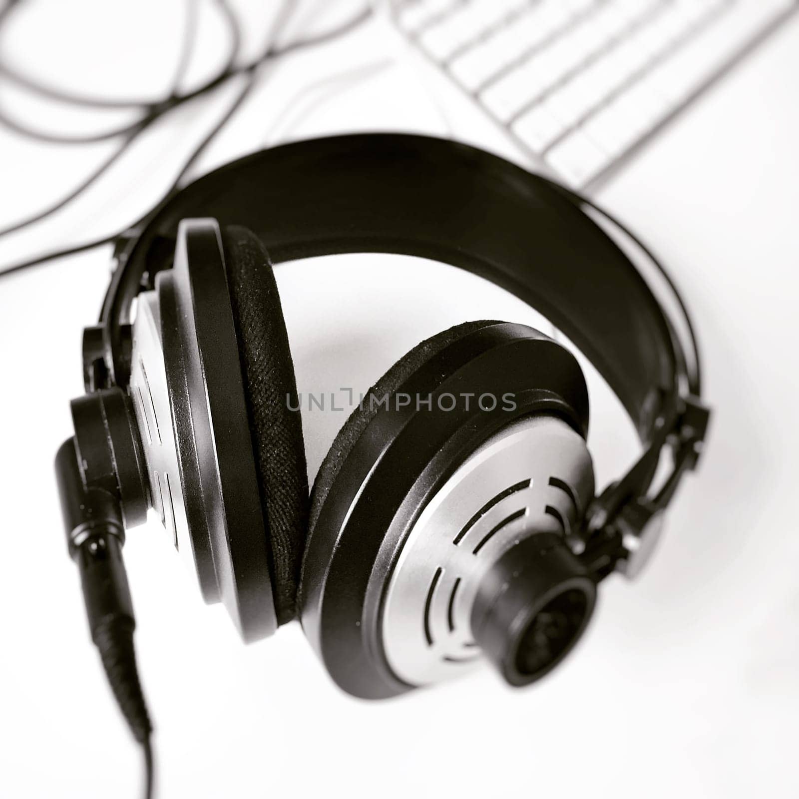 black and white stereo headphones. selective focus. Music and relaxation concept