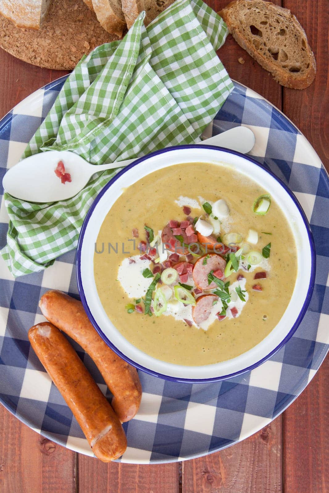 Hearty potato soup with smoked sausages and bacon