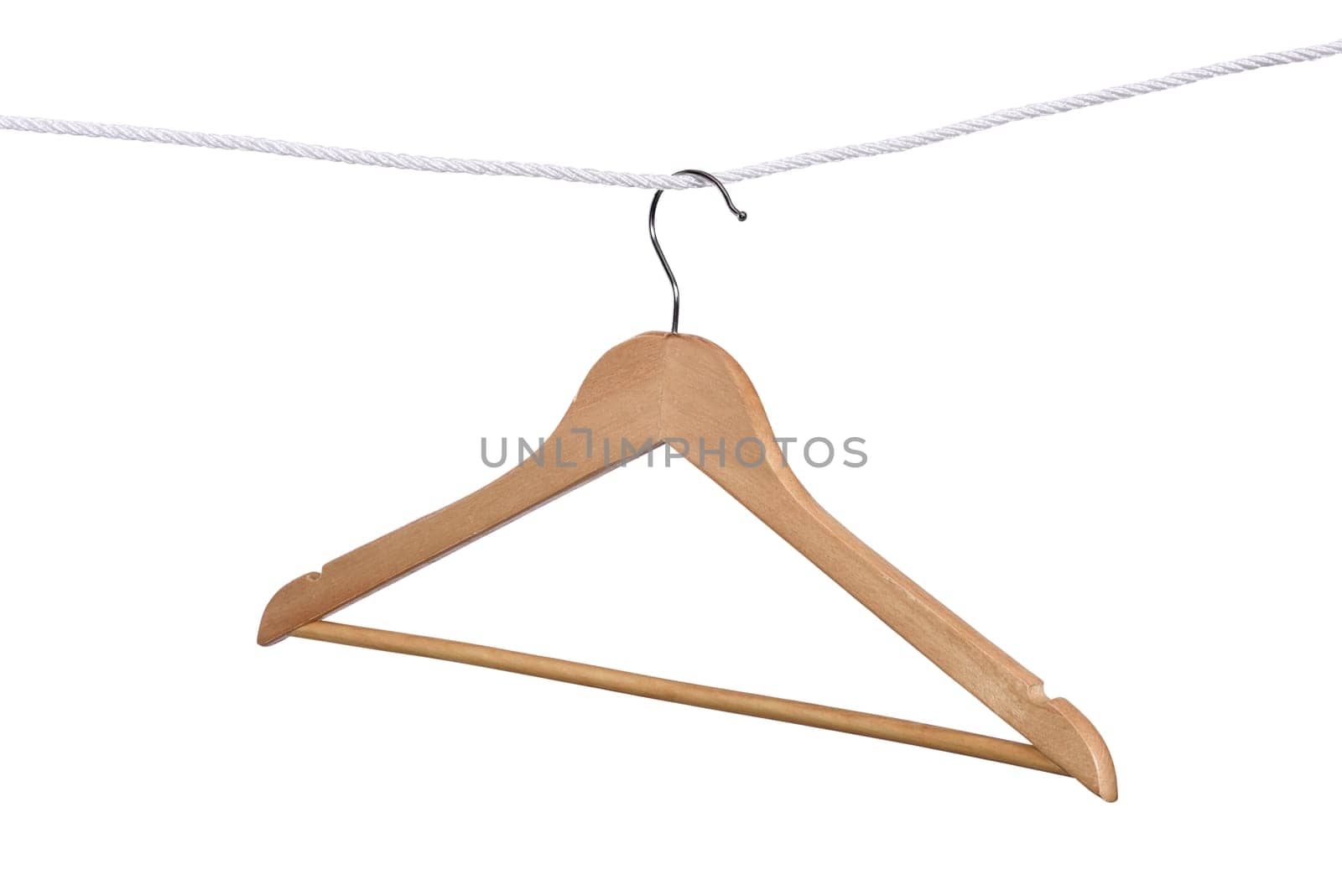 Clothes hanger hanging on the rope isolated over white background