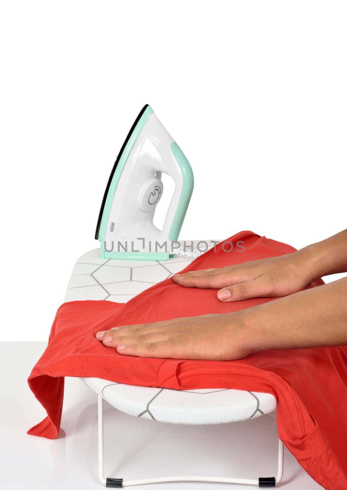 Male hand prepare the clothes to ironed on ironing board isolated over white background