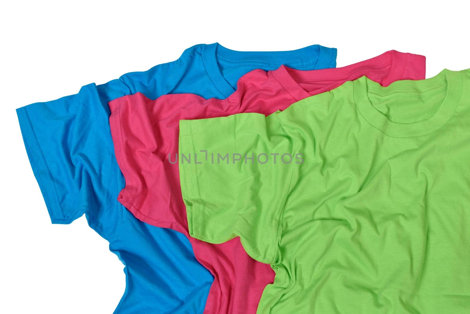 Untidy colorful clothes pile isolated over white background
