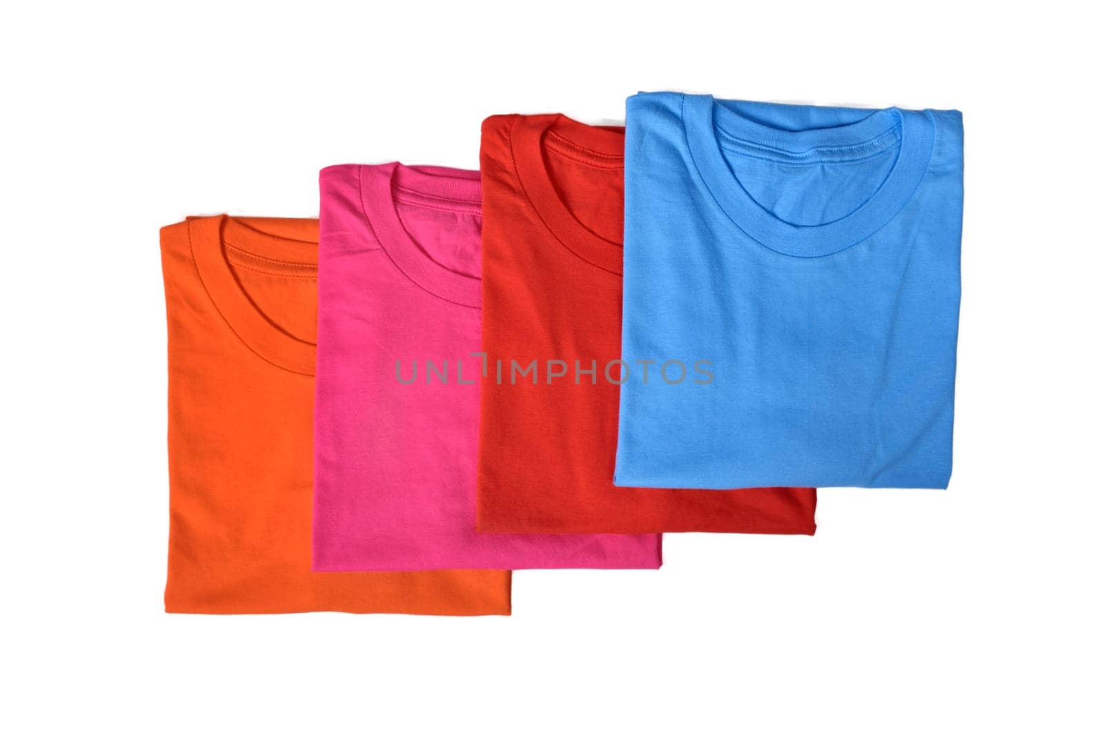 Row of colorful shirts isolated over white background