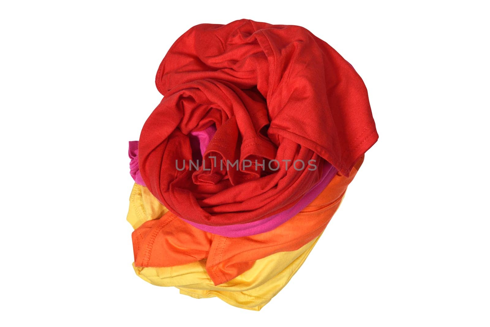 Stack of messy clothes isolated over white background