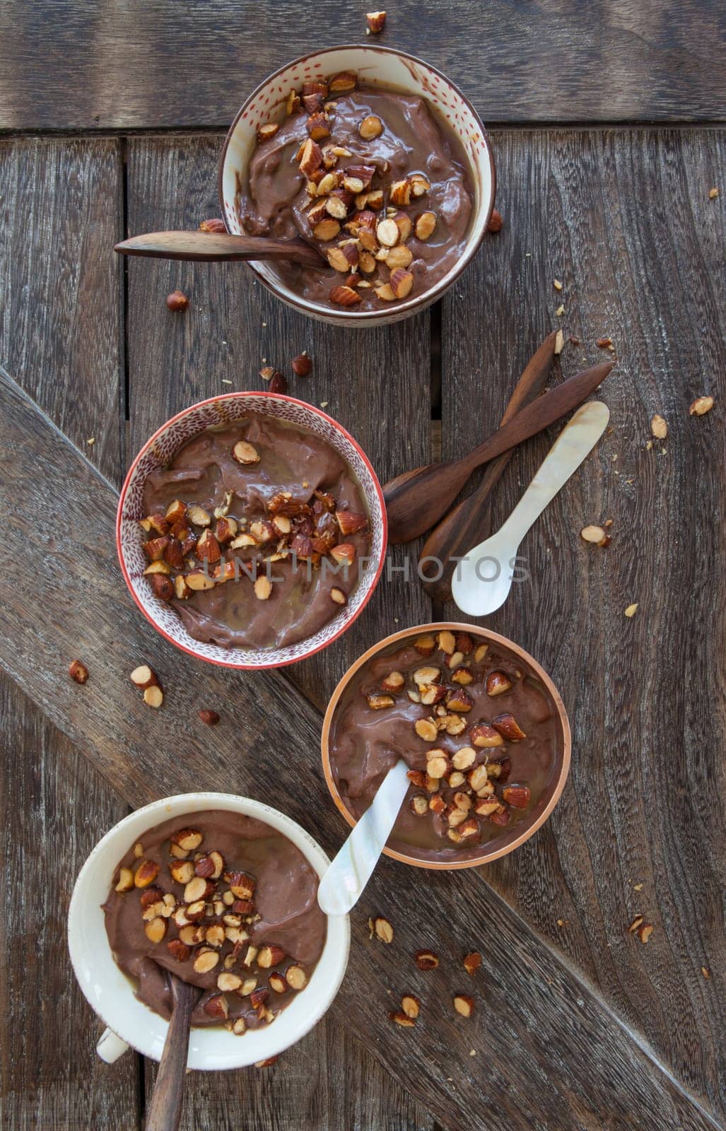 Delicious chocolate pudding with roasted almonds and caramel sauce