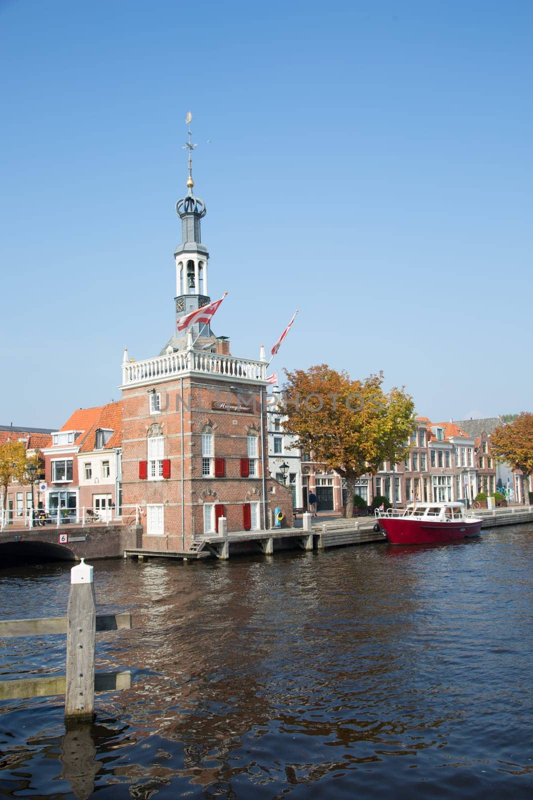 Alkmaar, The Netherlands - September 24, 2017  Dutch motorboat moored at the quay in the historic center of Alkmaar, The Netherlands  .
