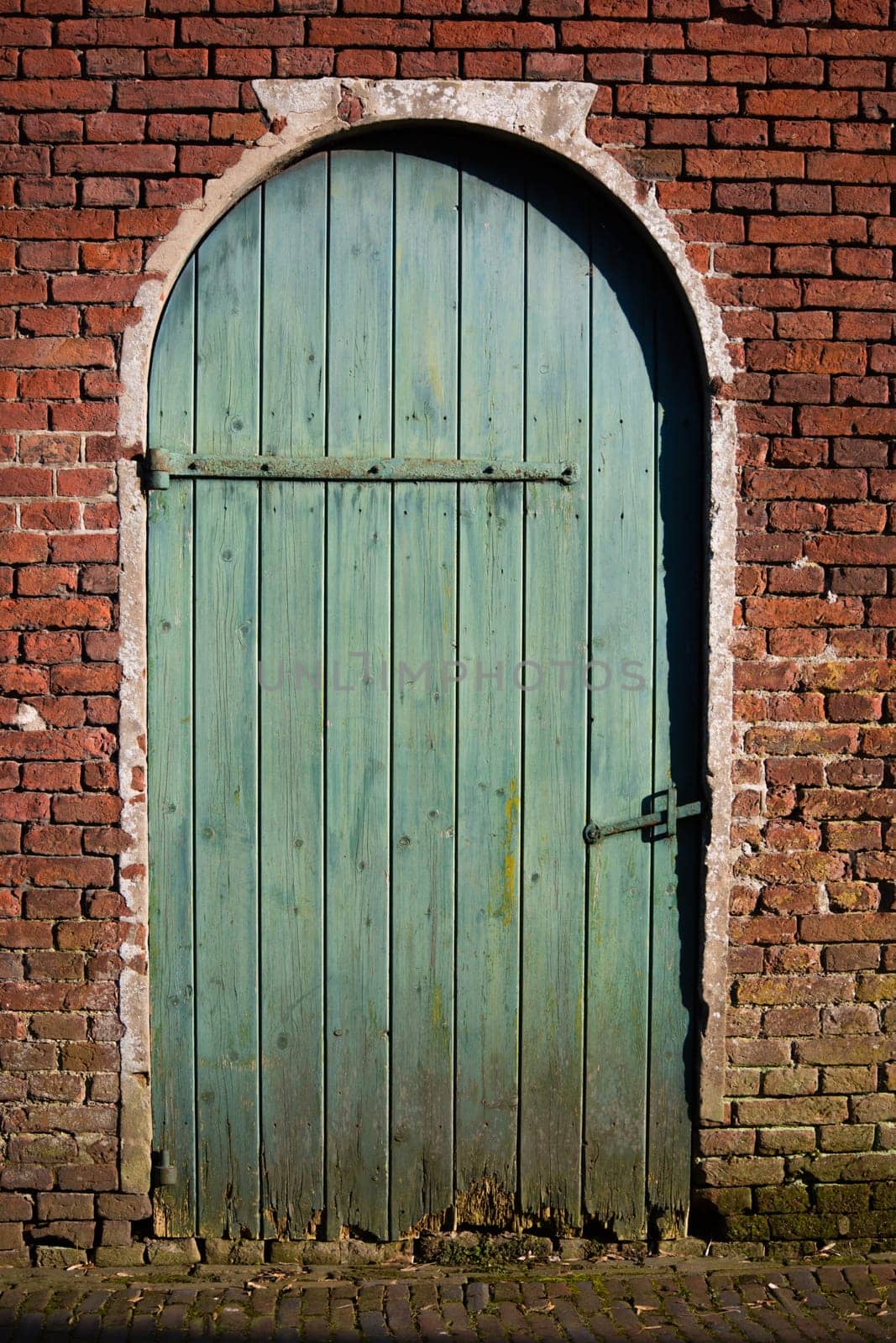 Old green wooden door.