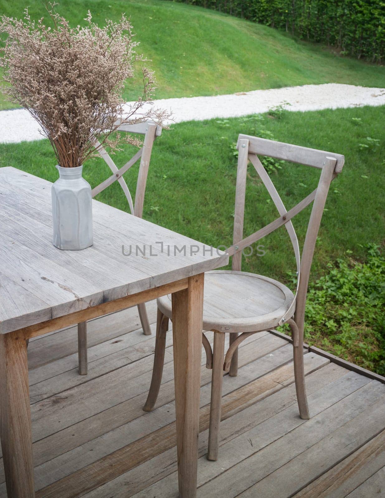 Available restaurant seat in outdoor garden stock photo