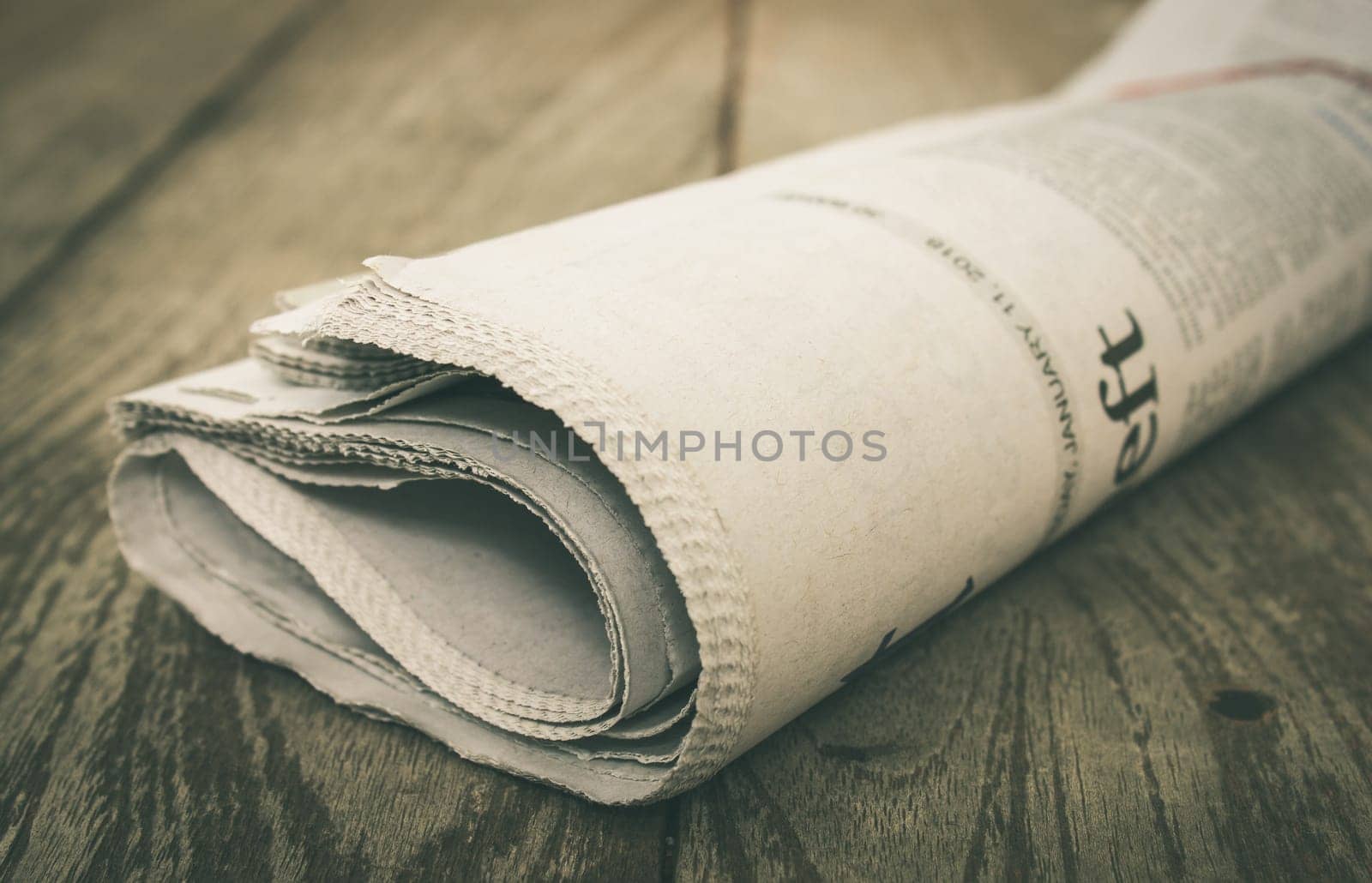 Newspaper on Wood Concept about Journalist or Business. Foreign Newspaper background